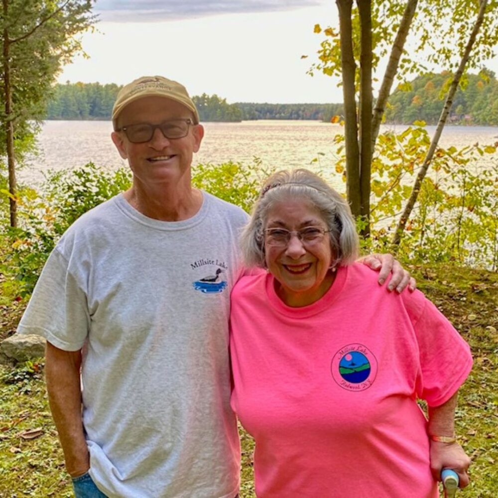 Bob and Gail Wright standing in front of lake