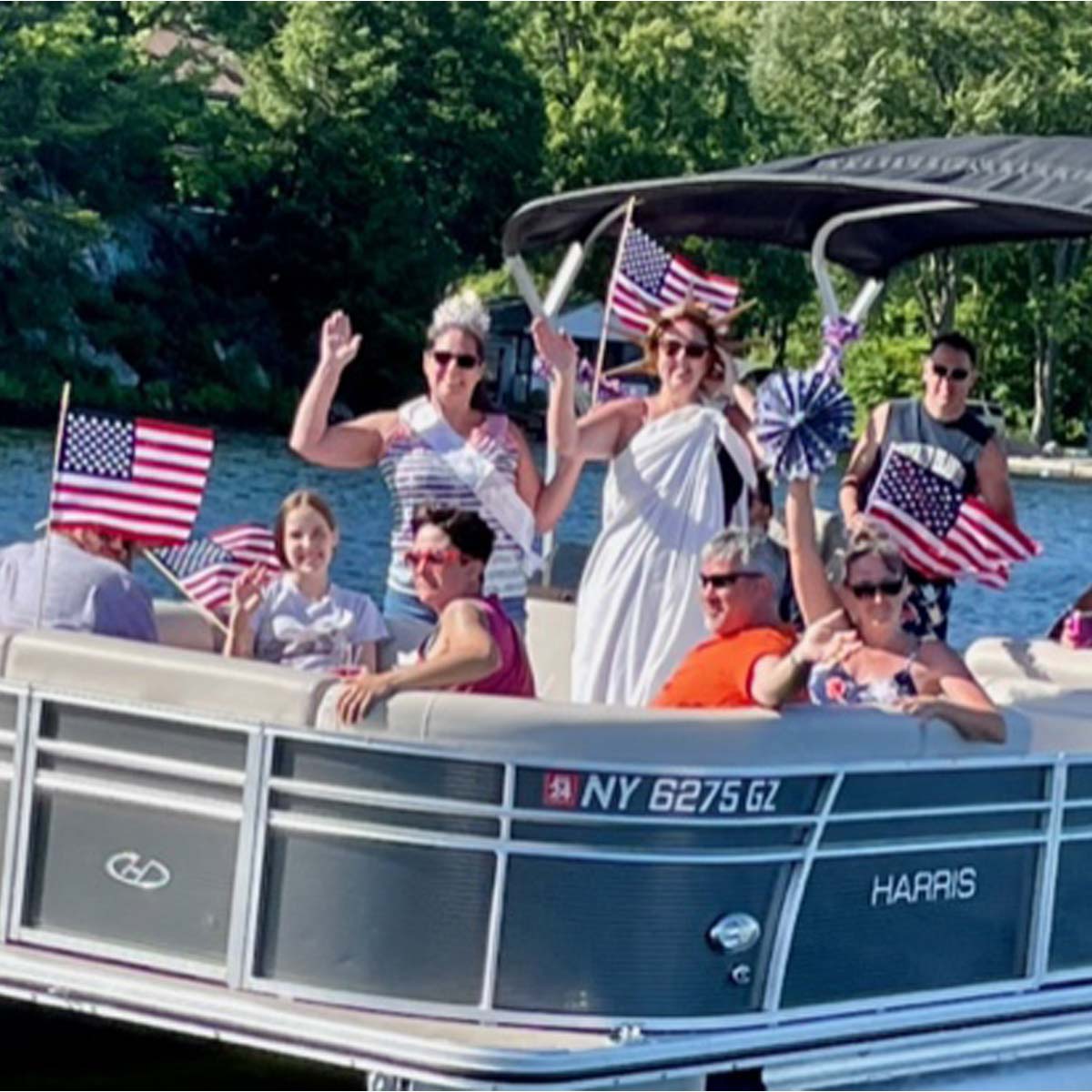 people dressed a s lady liberty for the parade