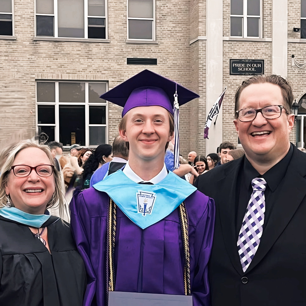 Elijah Mclrath with graduation outfit on