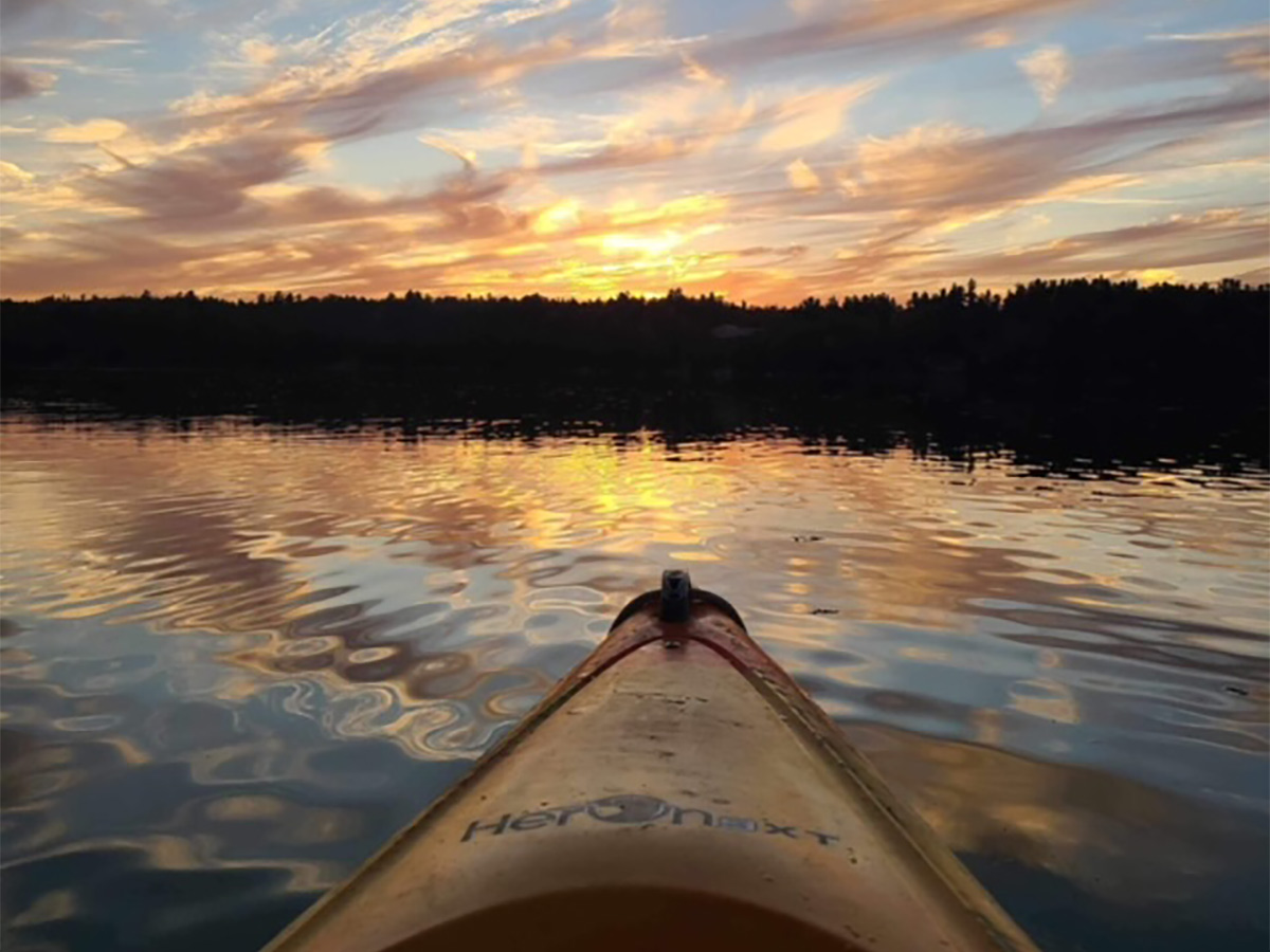 Kayaker Watching Sunset